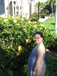 Jin with Hibiscus bush