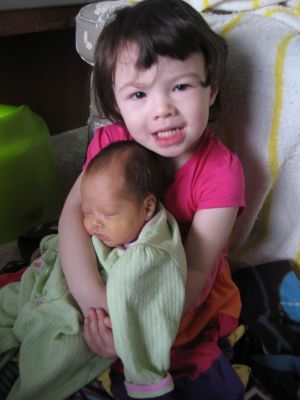 Sisters
Big sister is thrilled about little sis
